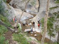 Hikers exploring the bottom of the canyon